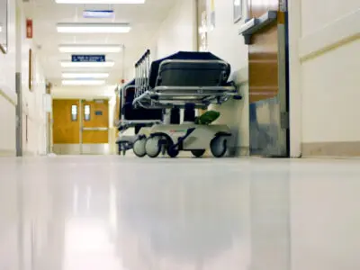 hospital hallway with an empty gurney