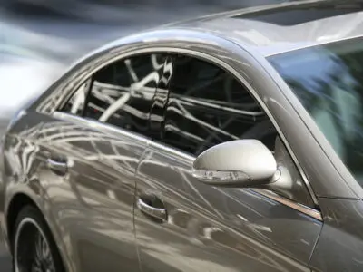 side view of a silver sedan