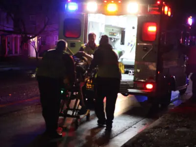 the scene of a car crash with an ambulance