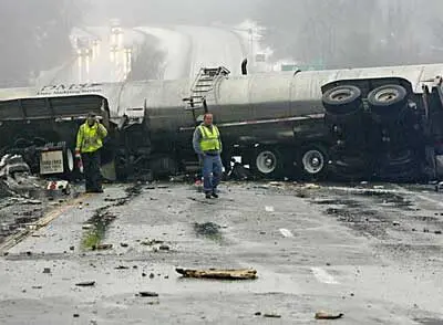 semi-truck rollover accident on the highway