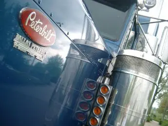 blue Peterbilt semi-truck