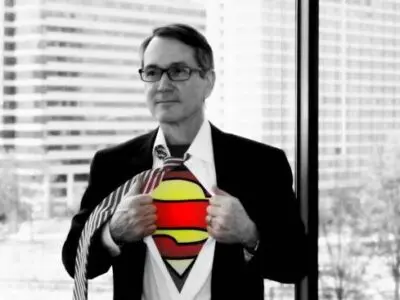 Attorney Wayne Grant wearing Superman costume under suit