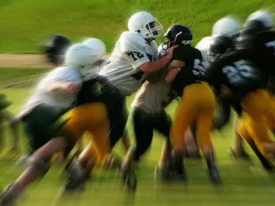 two youth football teams playing each other