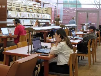 student at library