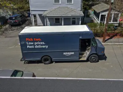 Amazon truck in a residential area.