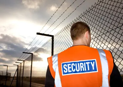security near a barbed wire fence