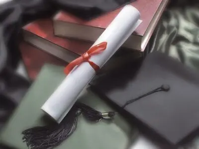Gradation caps and a diploma.
