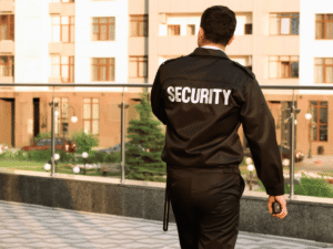 Security guard patrolling residential property during daytime